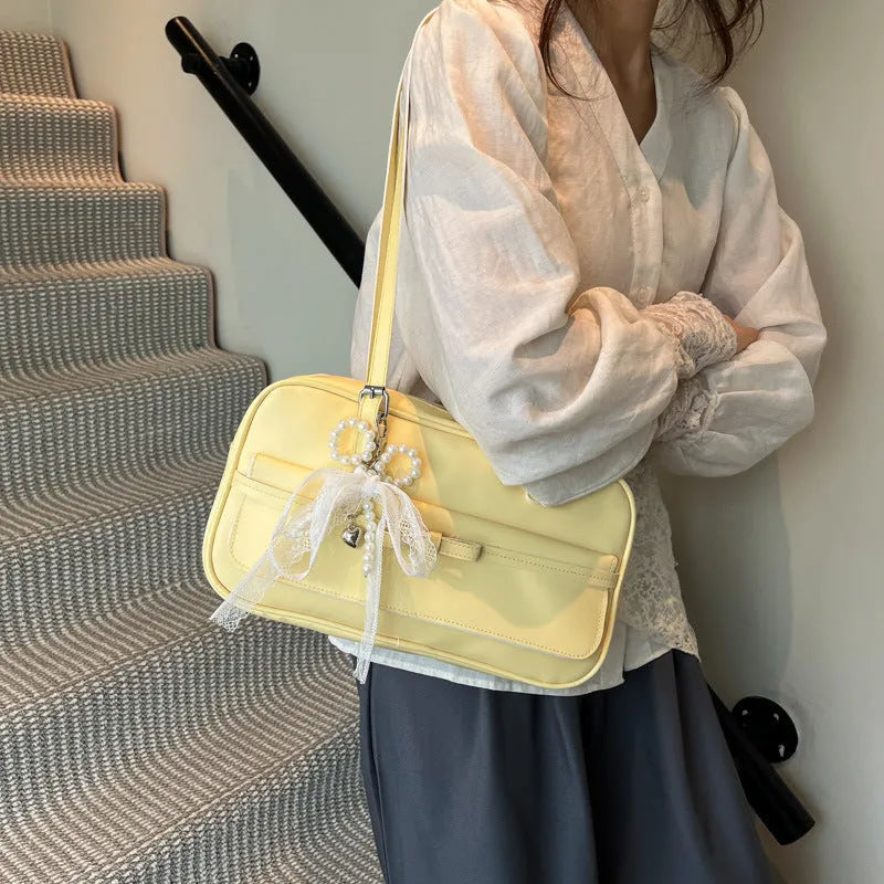 PU leather single-shoulder flap bag in urban simplicity style with bow stitching decoration