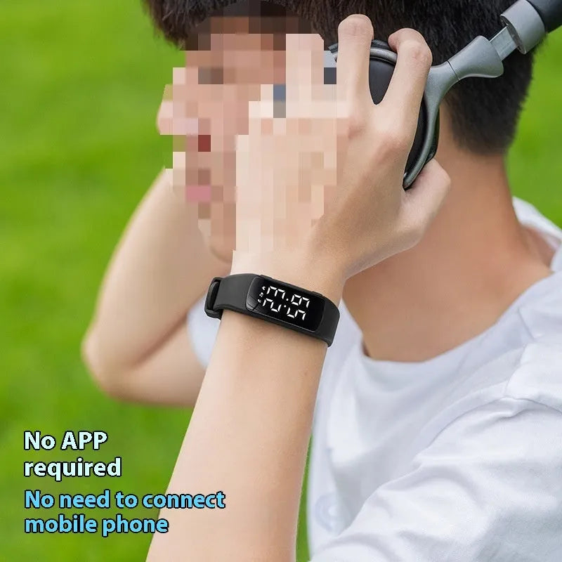 Black vibration alarm smart watch with LED display on a silicone strap, showing 50m waterproof rating.