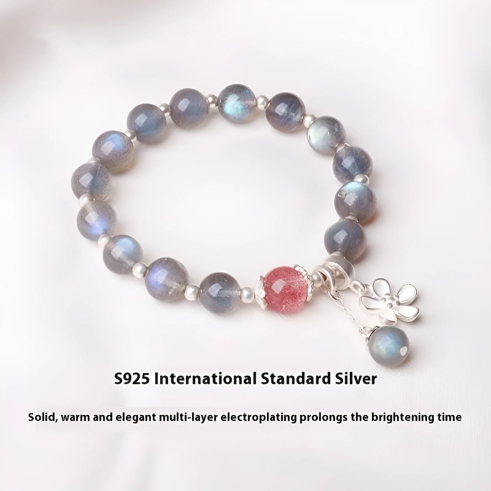 Women's moonstone bracelet with 7.5mm grey stone, red quartz accents and sterling silver