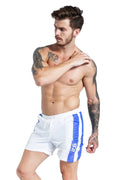 Men's blue sports shorts with lace-up closure and slim fit design for running and casual wear