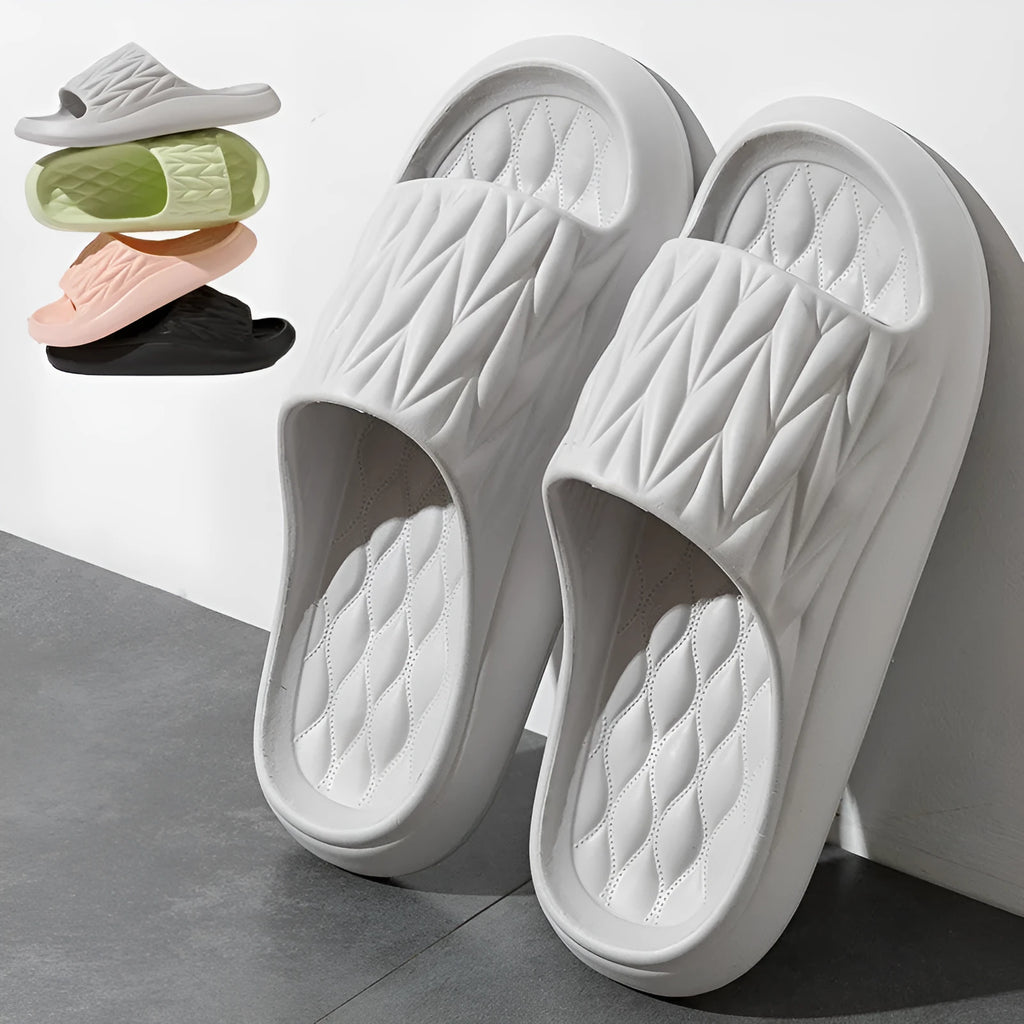 Leaf texture design EVA indoor slippers in multiple colours on a white background.