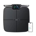 Black eight-electrode body fat scale on floor measuring 45x45cm