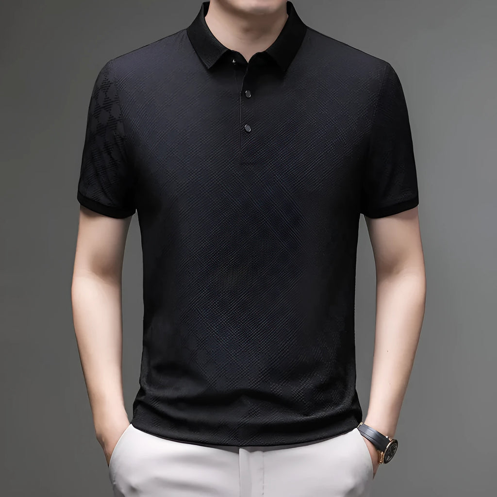Thin Ice Silk blend short sleeve T-shirt in black with a V-neck and slit hem detail on a hanger.