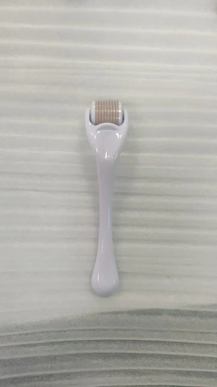 Sterile micro needle derma roller with PC handle in selected colour and 0.2mm, 0.25mm, or 0.3mm needle wheel.