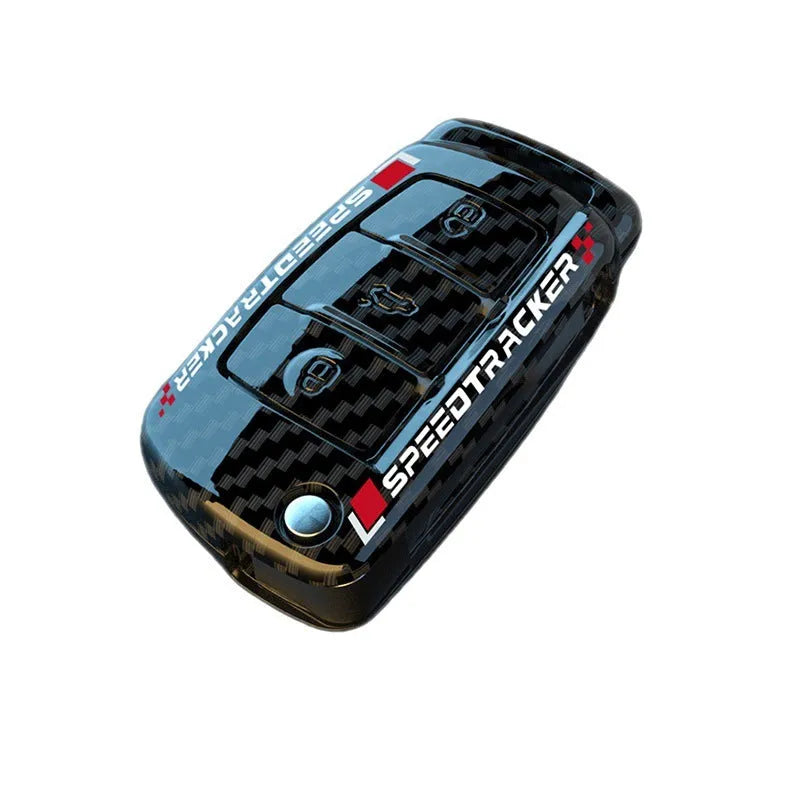 White and carbon coloured car key holders with a carbon fibre texture and mirror surface.