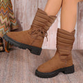 Women's black suede snow boots with chunky heel, lace-up design, and fleece lining