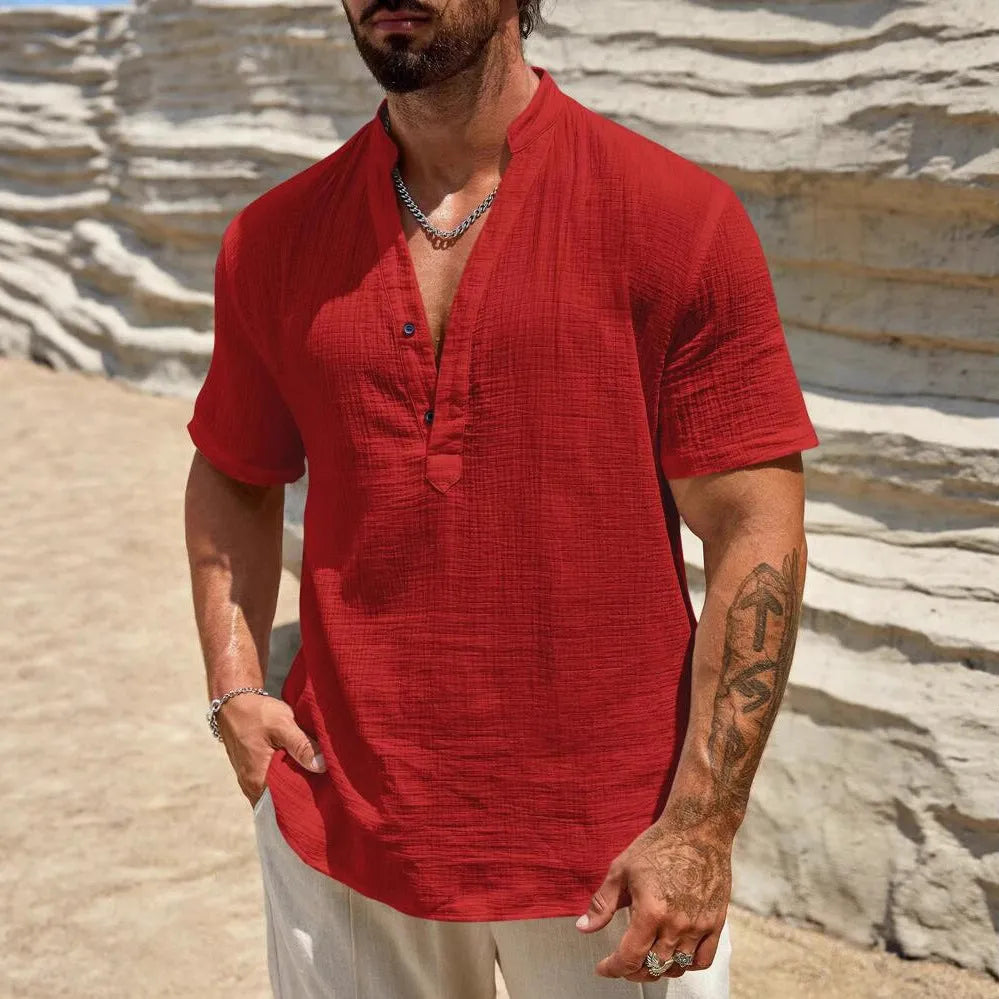 Men's solid colour stand collar short-sleeved shirt with slit detail in light blue.