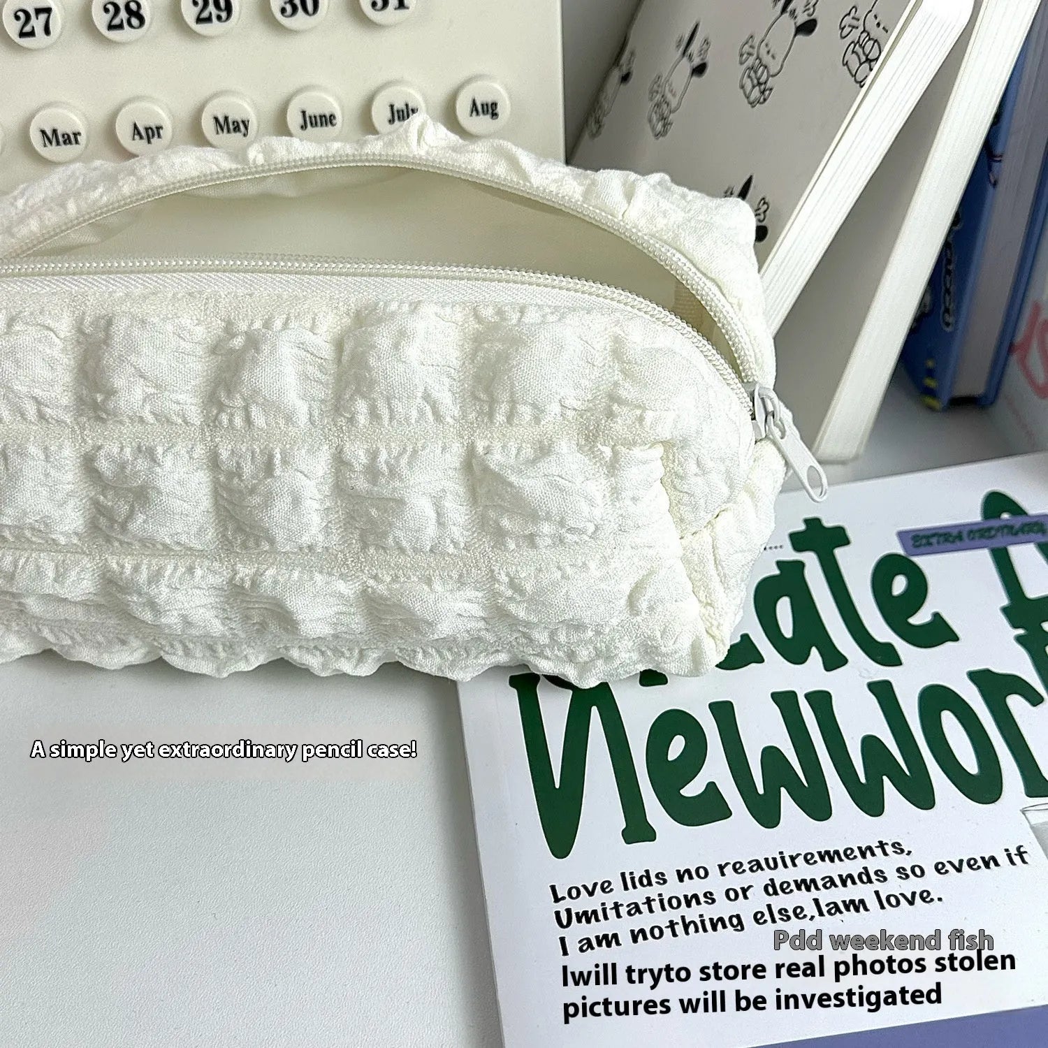 Cream puff fabric pencil case in beige or black colour with zippered closure