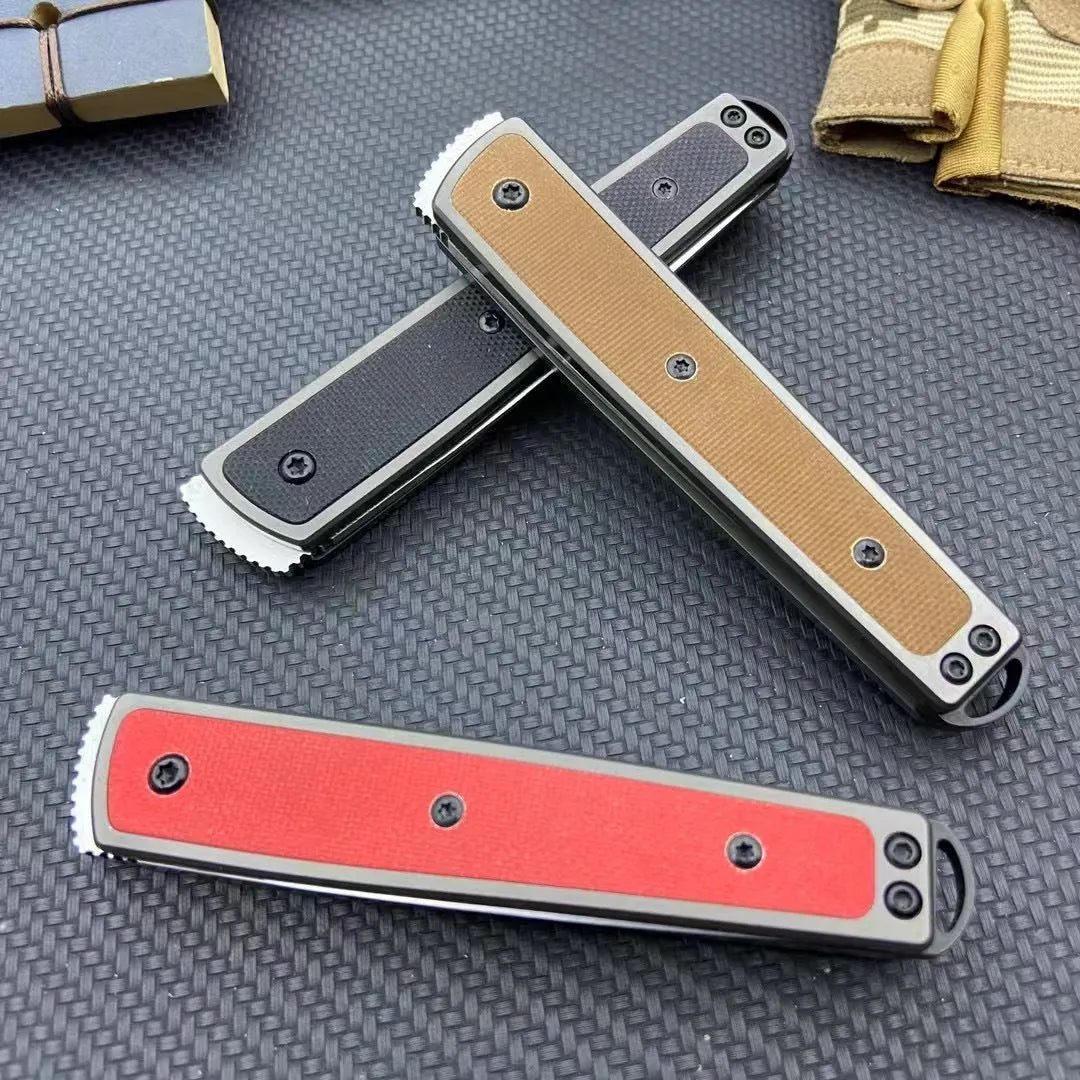 Closed and open views of a folding fruit knife with a coloured handle and stainless steel blade.