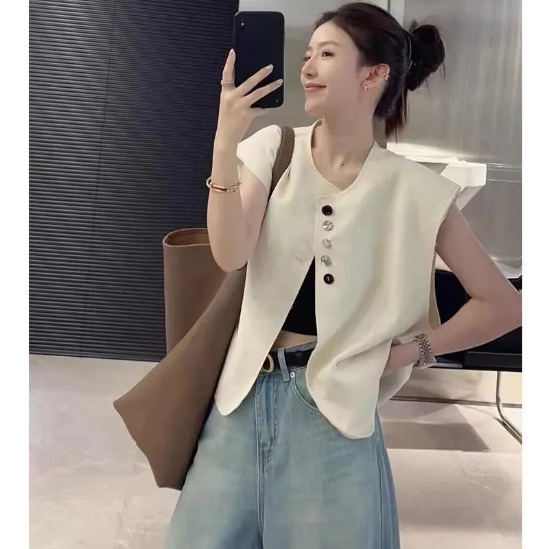 Women's loose fit polyester vest with pocket in milky white or black, 40cm short length