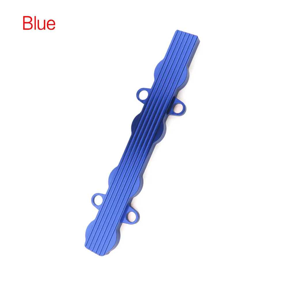 Aluminium engine housing panel in blue, red, and silver colours, showing versions with and without holes.