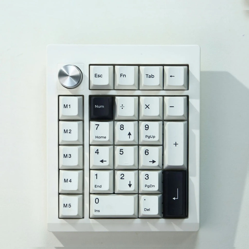Black and white wireless mechanical numeric keyboard with Bluetooth connectivity