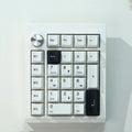 Black and white wireless mechanical numeric keyboard with Bluetooth connectivity