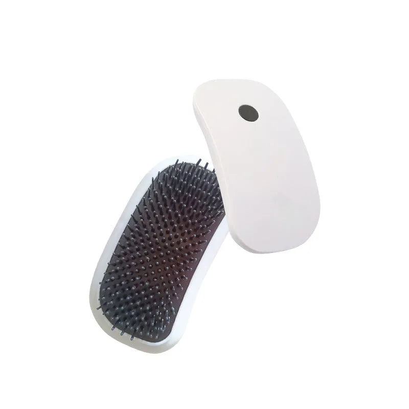 Pink electric pet massage brush with TPE comb teeth for grooming cats and dogs