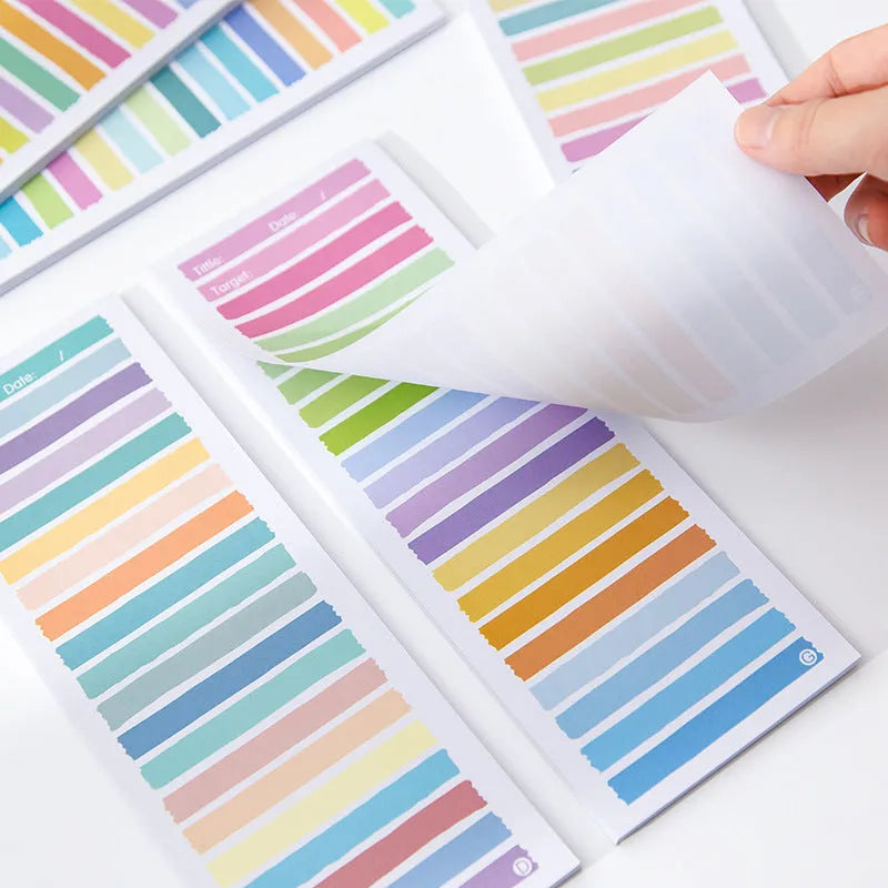Cartoon-design notepad with plastic storage box in blue, pink, purple, or yellow.