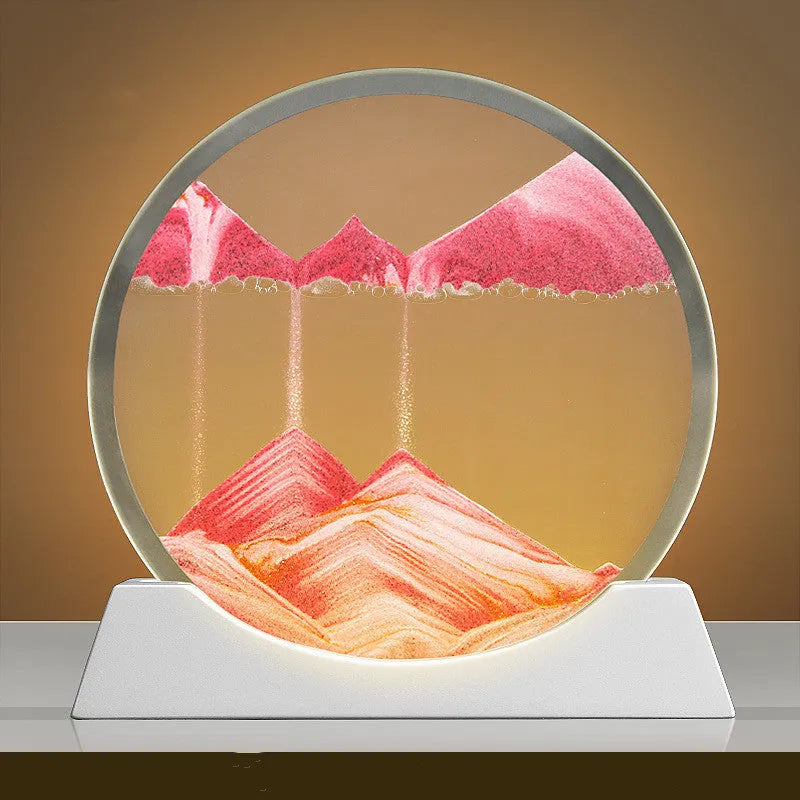 Rotating quicksand painting inside a modern 12-inch glass night lamp on a desktop