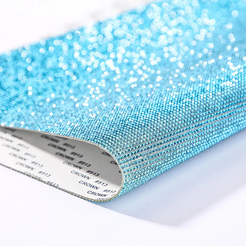 Rhinestone adhesive sheet with eight-eye pattern in multiple colour options on white background