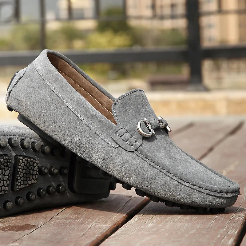 Men's black slip-on leather shoes with square toe and decorative stitching