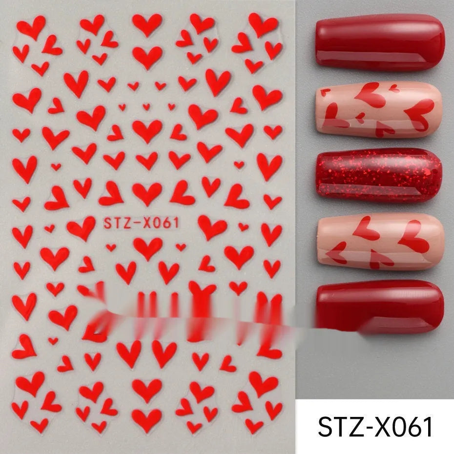 Close-up of a cartoon-style nail sticker with black and silver strips and a love pattern design on a fingernail.