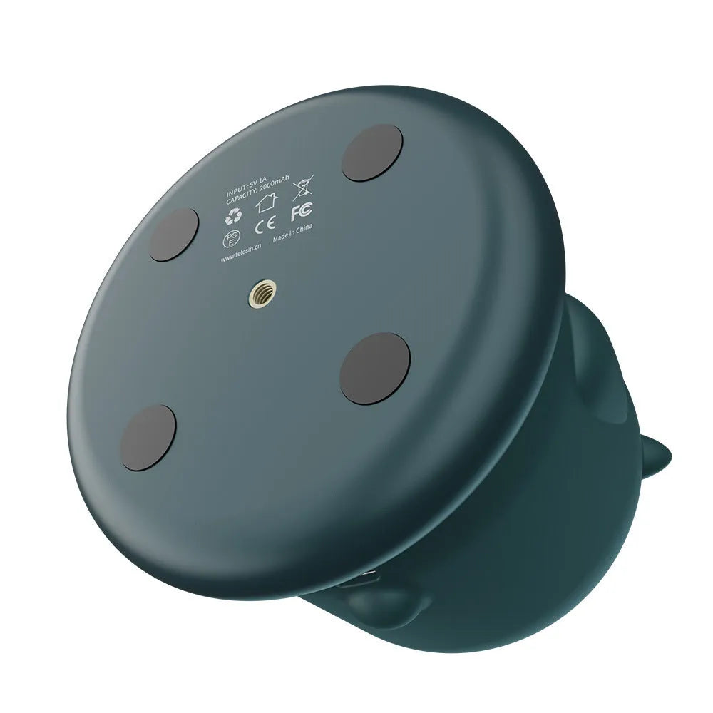 Dark green AI face recognition gimbal showing 360° rotation with smartphone mounted