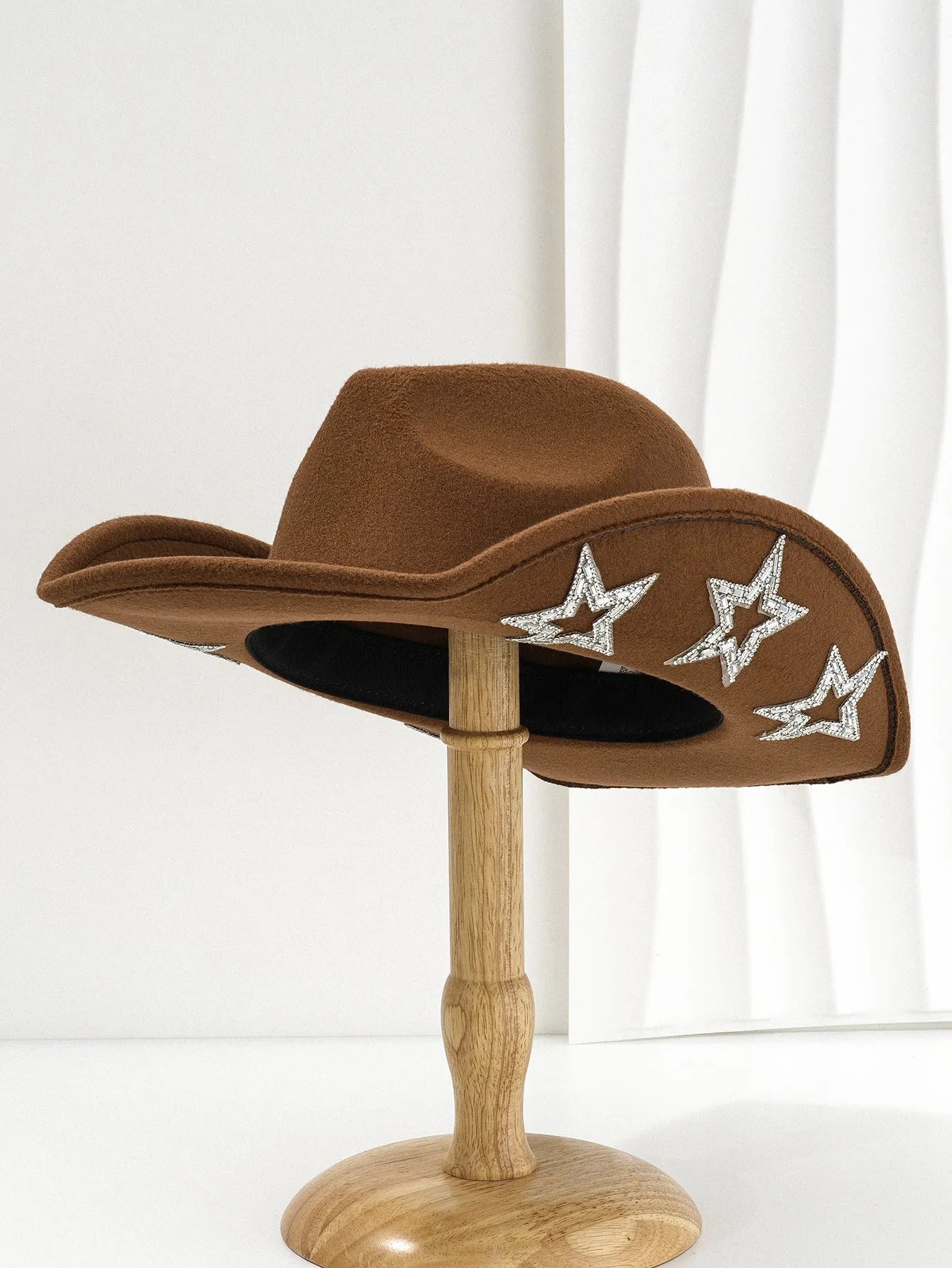 Beige polyester Western denim top hat with a conical crown and a hexagonal star decoration on the front.