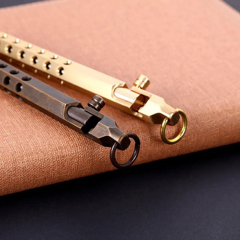 Brass hexagonal roller pen with 0.5mm tip showing six flat sides and retro design