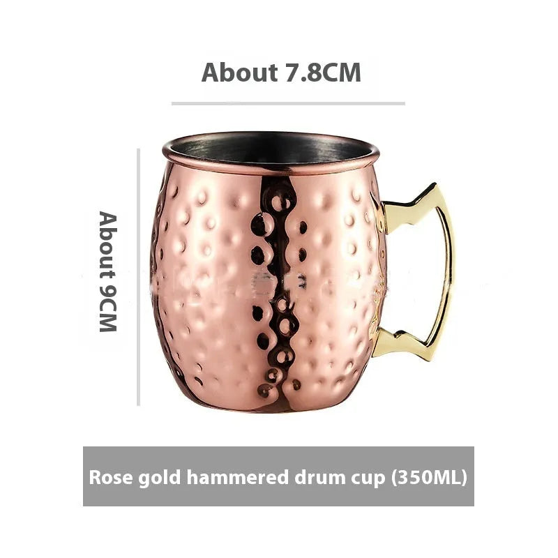 Copper plated stainless steel Moscow Mule mug in hammered and smooth styles, shown in silver, gold, rose gold, and black.