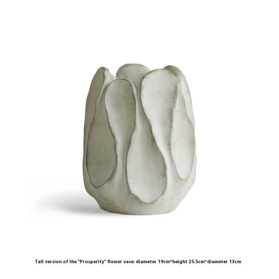 Irregular ceramic art vase in magnesium clay with resin decorative elements for floral arrangements