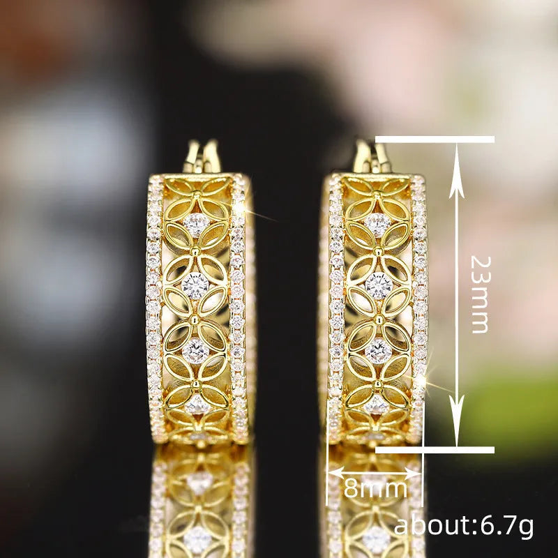 Geometric copper clip earrings with horse eye flower butterfly design in yellow gold colour
