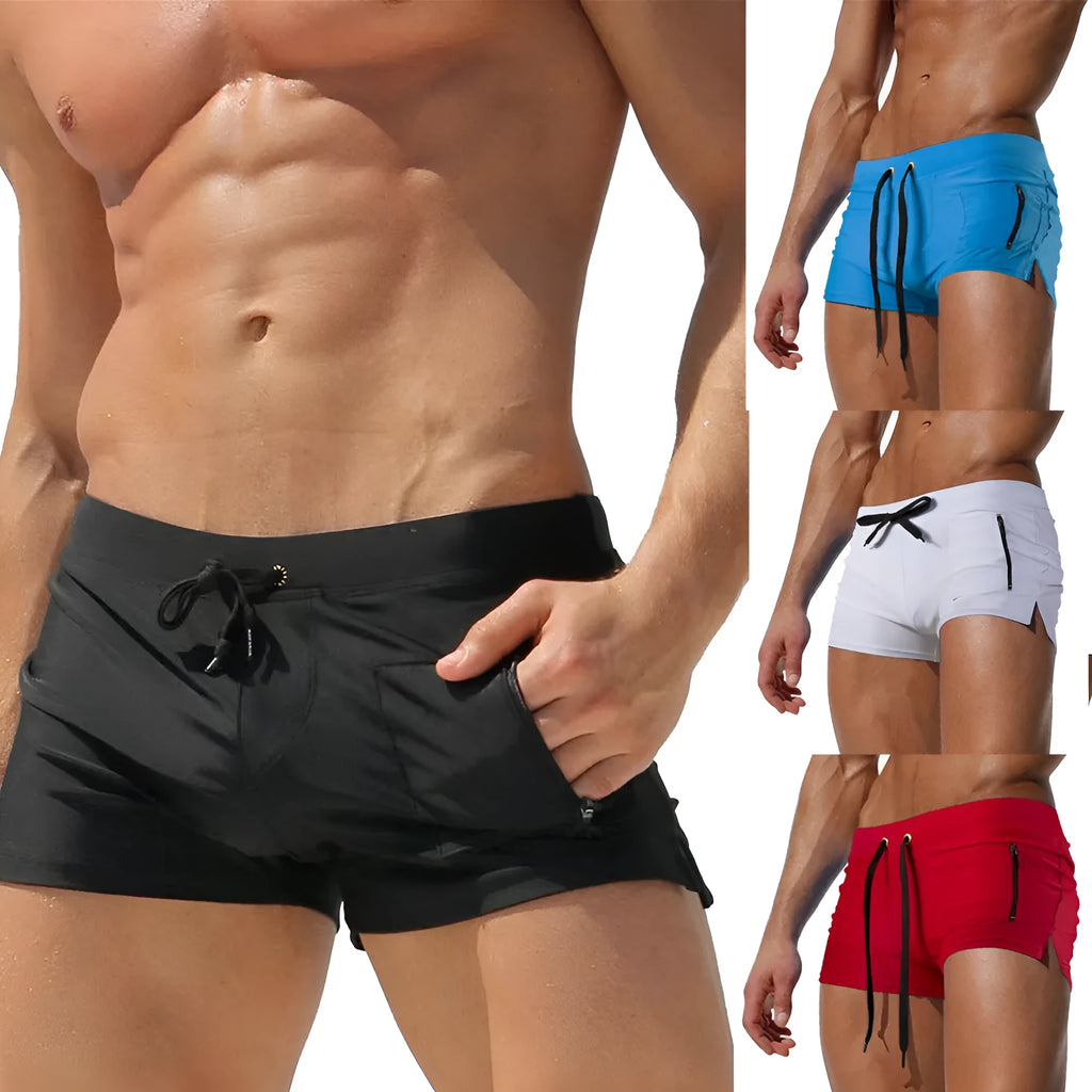 Men's solid colour high-waist swimming trunks with lace-up front, shown in black, for swimming and fitness