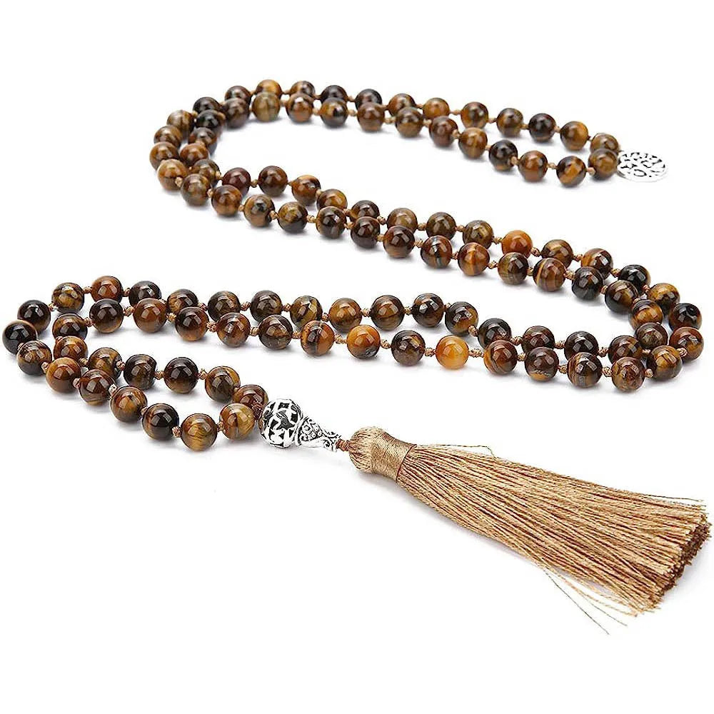 Handmade knotted beaded necklace with stone pendant showing 108 beads and geometric design