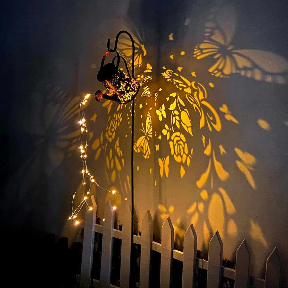 Butterfly pattern solar garden lamp with tapered iron construction and warm white LED lighting