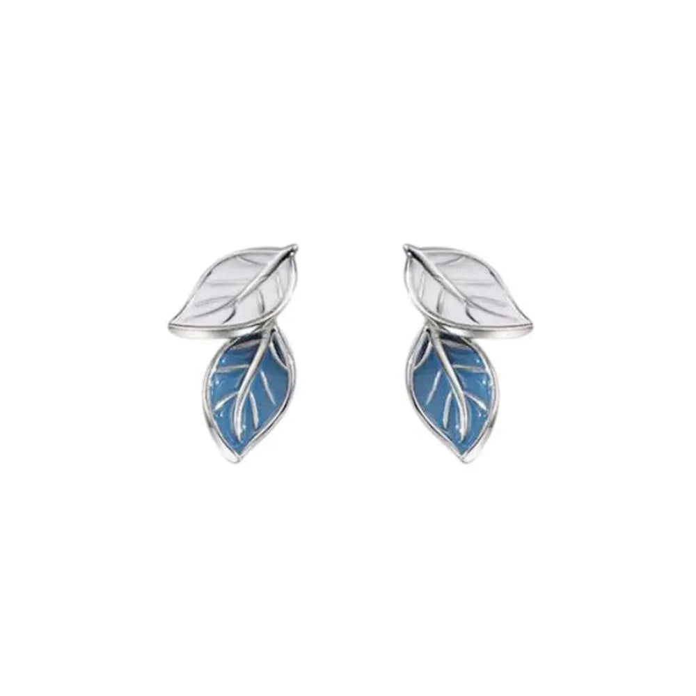 White gold plated copper leaf-shaped stud earrings for women on white background