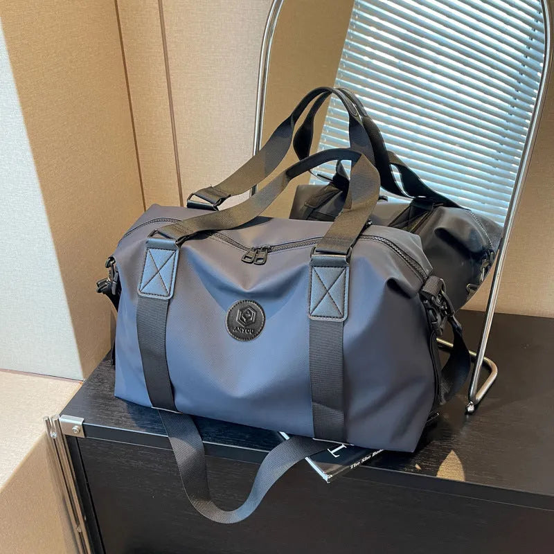 Large waterproof Oxford cloth travel bag in solid colour with 36-55L capacity for short-distance leisure travel