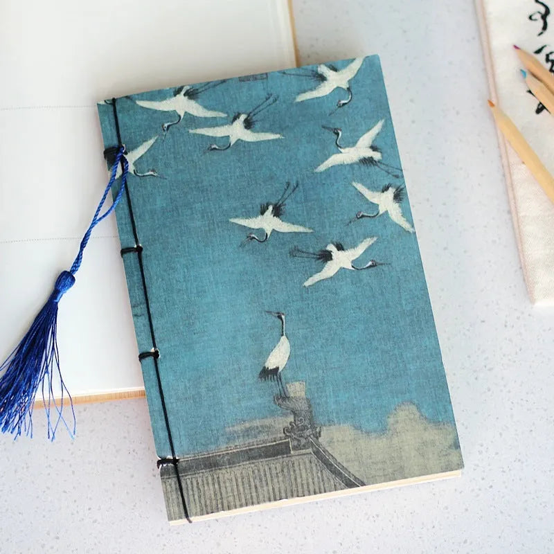 A5 antique wire-bound notebook with retro painting design on white cowhide cover