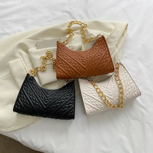 Brown pleated chain shoulder bag showing vertical square shape and adjustable strap