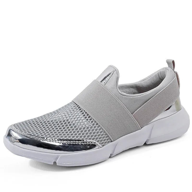 Women's low-top casual sneakers in blue with mesh material and a light-coloured sole.