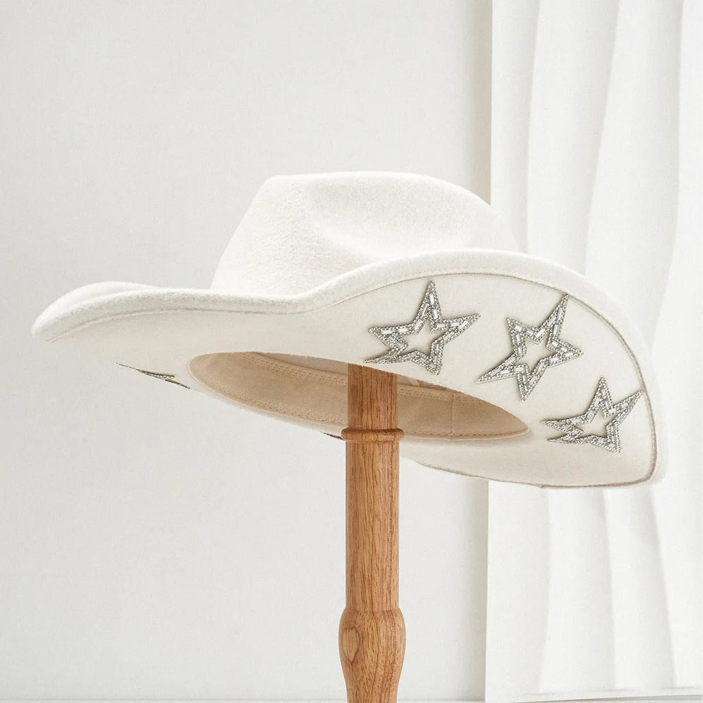 Beige polyester Western denim top hat with a conical crown and a hexagonal star decoration on the front.