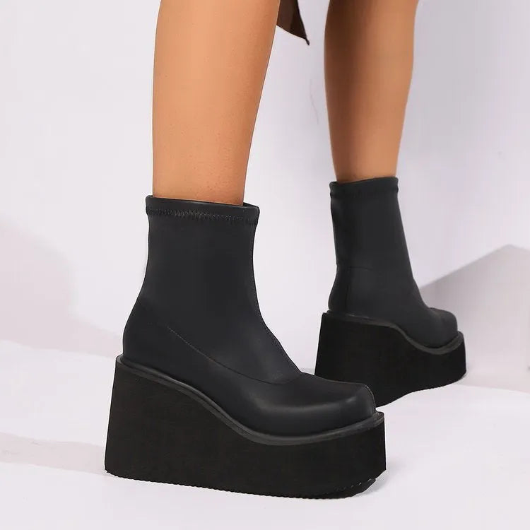Plus size women's wedge heel boots with waterproof platform sole and round toe design