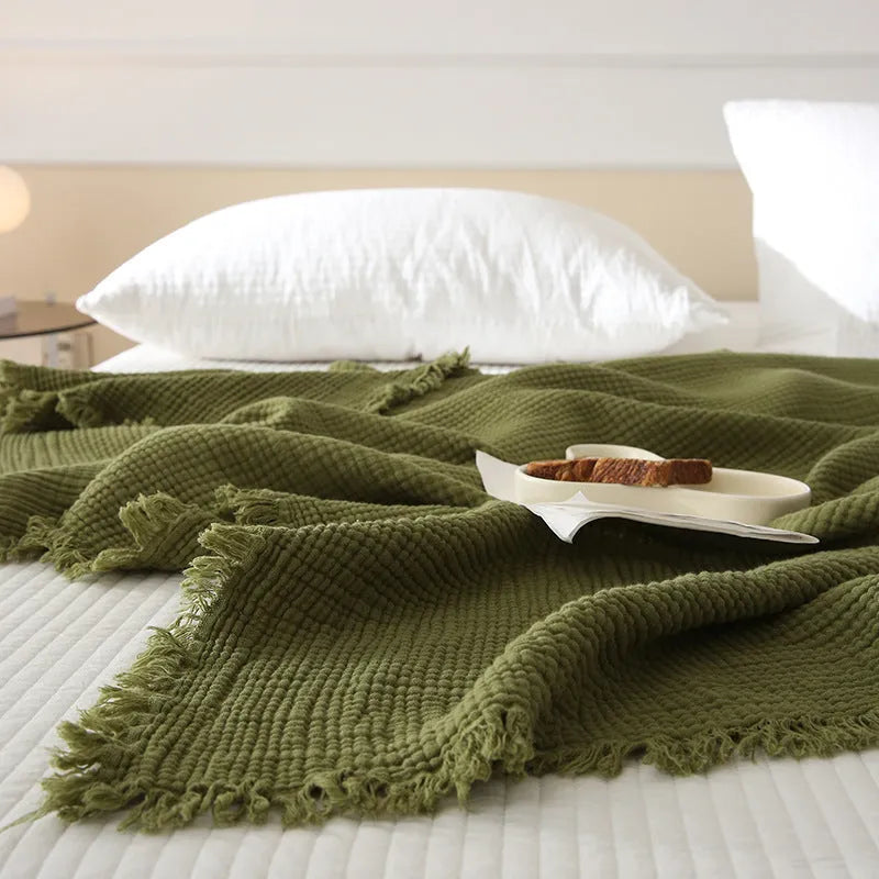 Four-layer gauze cotton blanket with tassel trim in navy blue colour