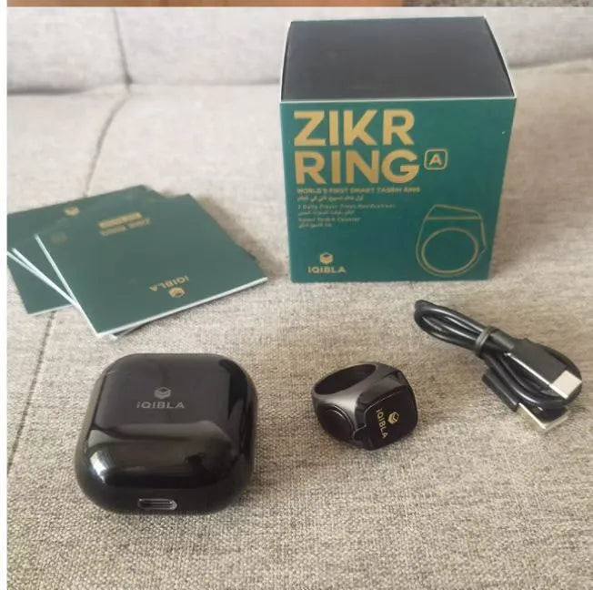 Zikr1 smart ring in black green rose gold silver colours with OLED display showing prayer times