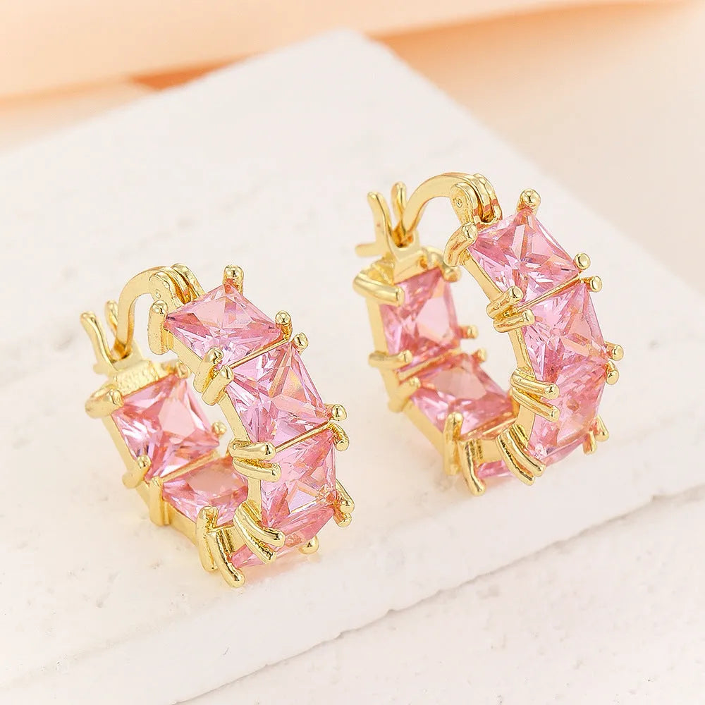 Geometric U-shaped ear rings with crystal zircon accents in black, pink, or white options