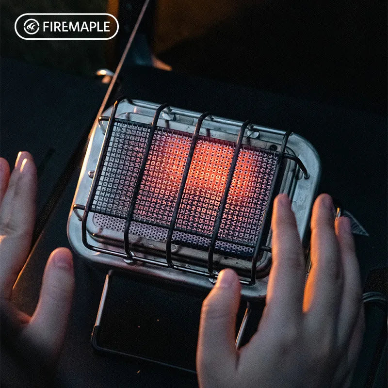 Compact metal outdoor electric heating stove with voltage regulator, shown in a silver finish.
