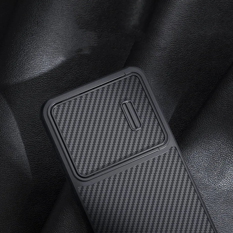 Black Samsung S23 Ultra mobile phone case with a flip-up lens cover over the camera, showing TPU+PC+carbon fibre construction.