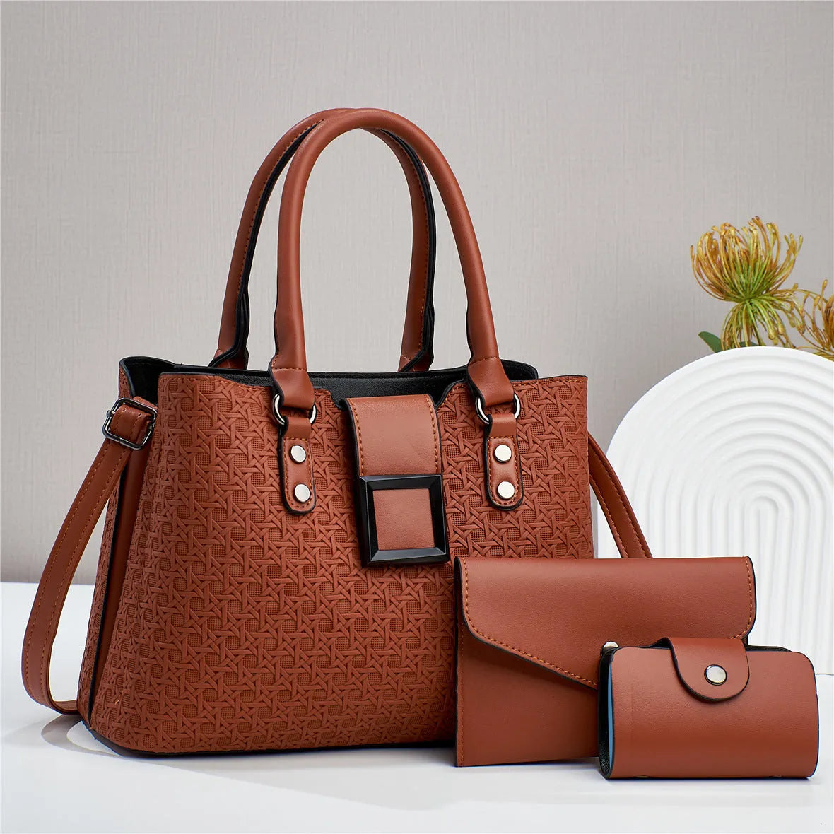 Textured weave design women's crossbody bag in apricot colour, showing internal organiser compartments.