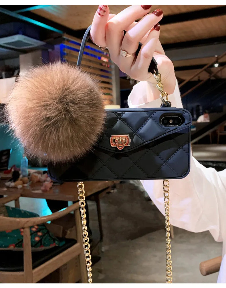 iPhone fluffy hairball plush phone case in dark green grid pattern made from flexible TPU material.