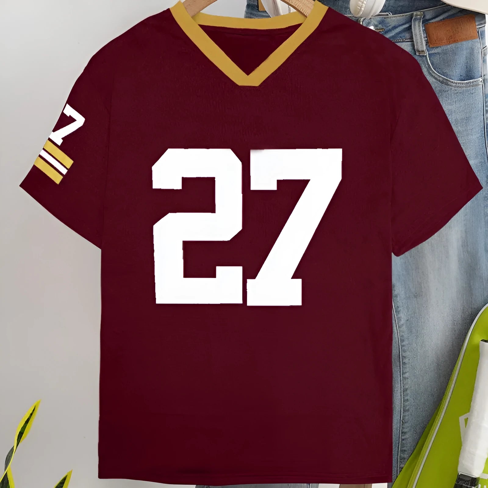 Red loose fit cotton T-shirt with contrasting colour digital letter printing on the front.