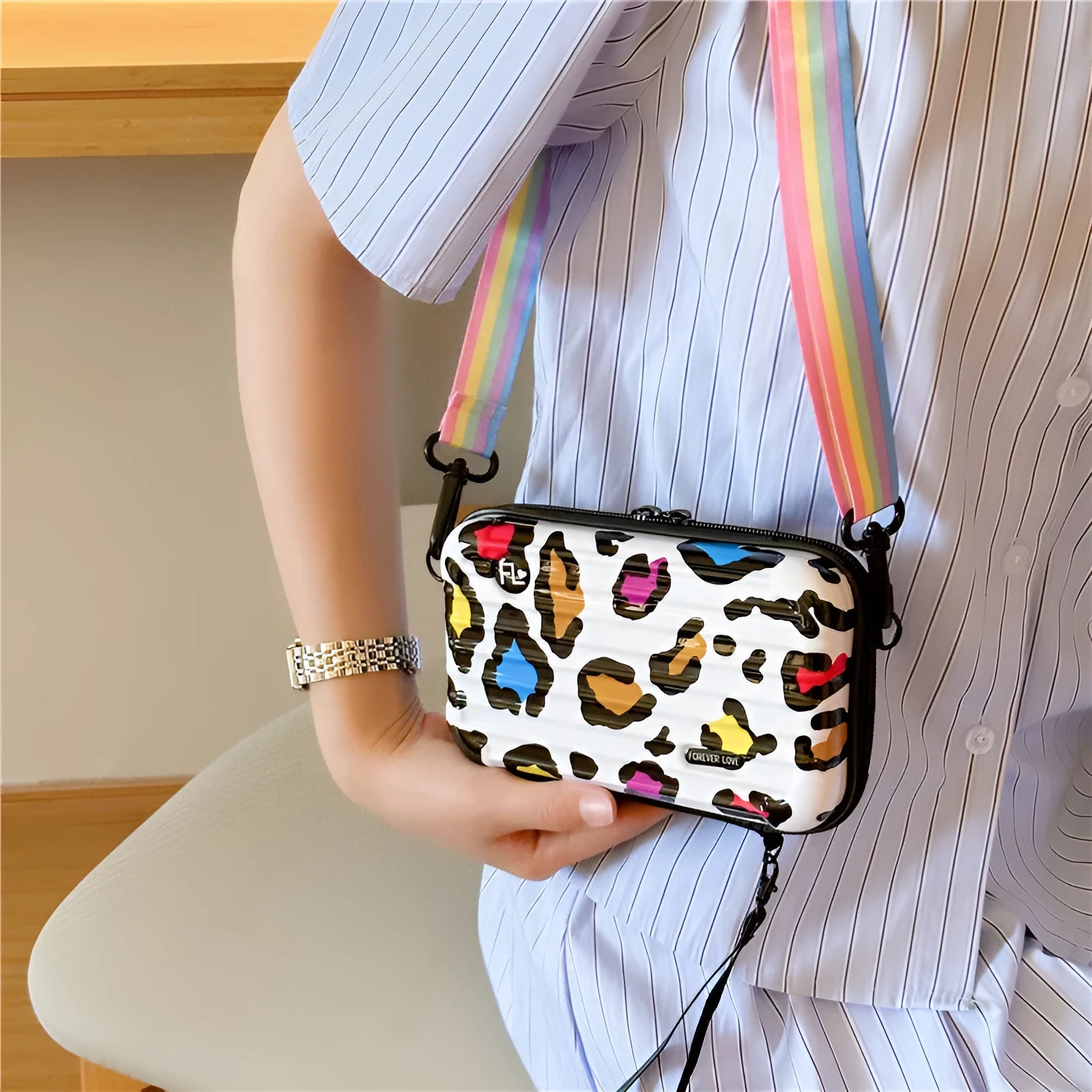 PVC geometric pattern one-shoulder cross body bag in one of ten colour styles, 18 cm wide, 11 cm high, with 110 cm shoulder strap