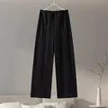 Women's polar fleece two-piece suit set showing long sleeve O-neck top with wide-leg trousers