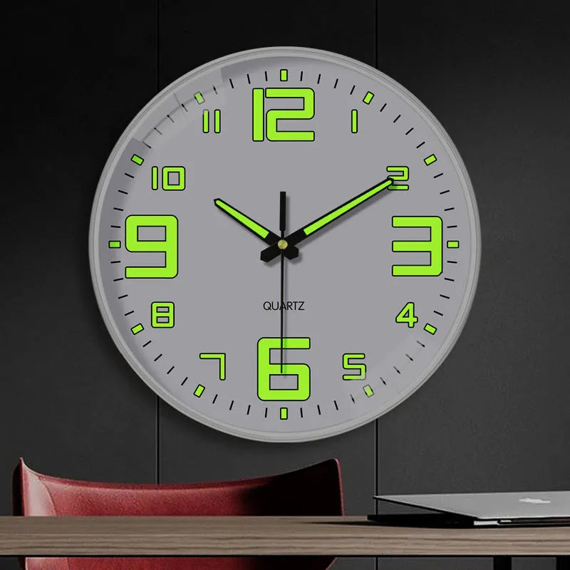 8 inch round luminous wall clock with modern plastic shell on a wall